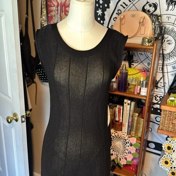 Caelian black open knit dress floral appliqué along lower hemline rounded neck